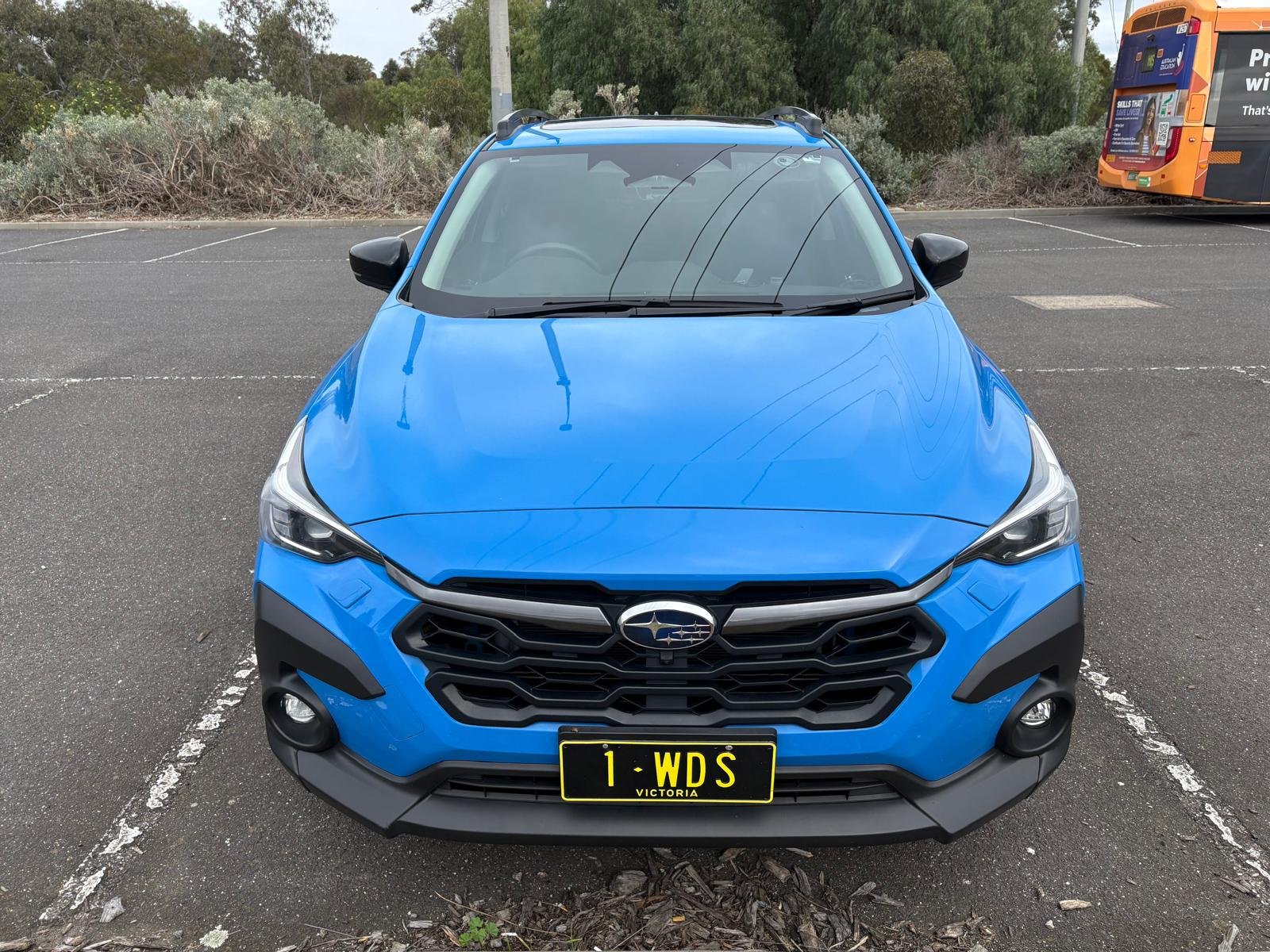 Blue Washington’s Drive School Subaru with 1-WDS number plate
