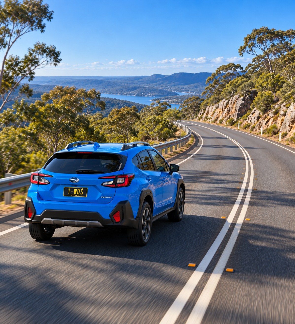 WDS blue Subaru illustrated on a winding coastal road